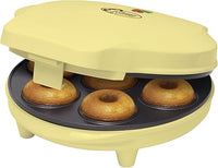 Bestron Appareil à donuts au Design Rétro, Mini-Machine à Donuts pour 7 petits Donuts, inclut Témoin de Cuisson & Revêtement Antiadhésif, 700 Watts, Sweet Dreams Collection, Couleur: Jaune