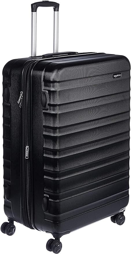 Amazon Basics Maleta rígida expandible: equipaje de viaje ABS con 4 ruedas giratorias dobles; diseño ligero y resistente a los arañazos, 52,6 x 32 x 78 cm, negro