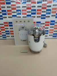 Exprimidor de cítricos Smeg CJF11PKEU