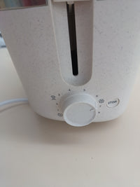 Tostadora eco 2 ranuras 8 niveles con calientabollos - Philips