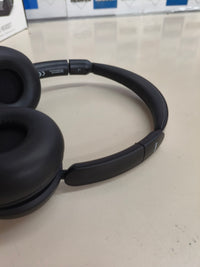 Auricular Bluetooth mono con base de carga para PC