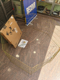 Parque metálico plegable para perros con puerta