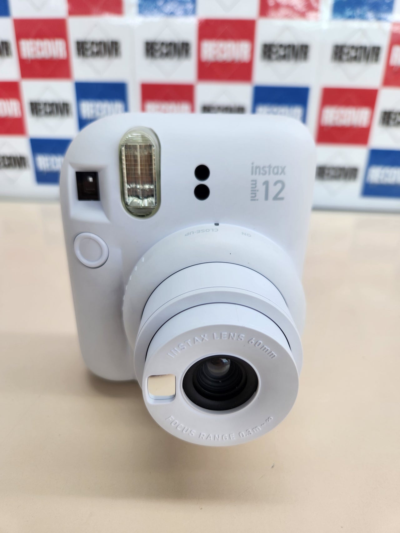 Cámara Instax Mini 12, color  Clay White