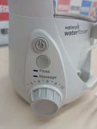Irrigador dental Waterpik Ultra con 10 niveles y 7 boquillas.