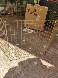 Parque metálico plegable para perros con puerta