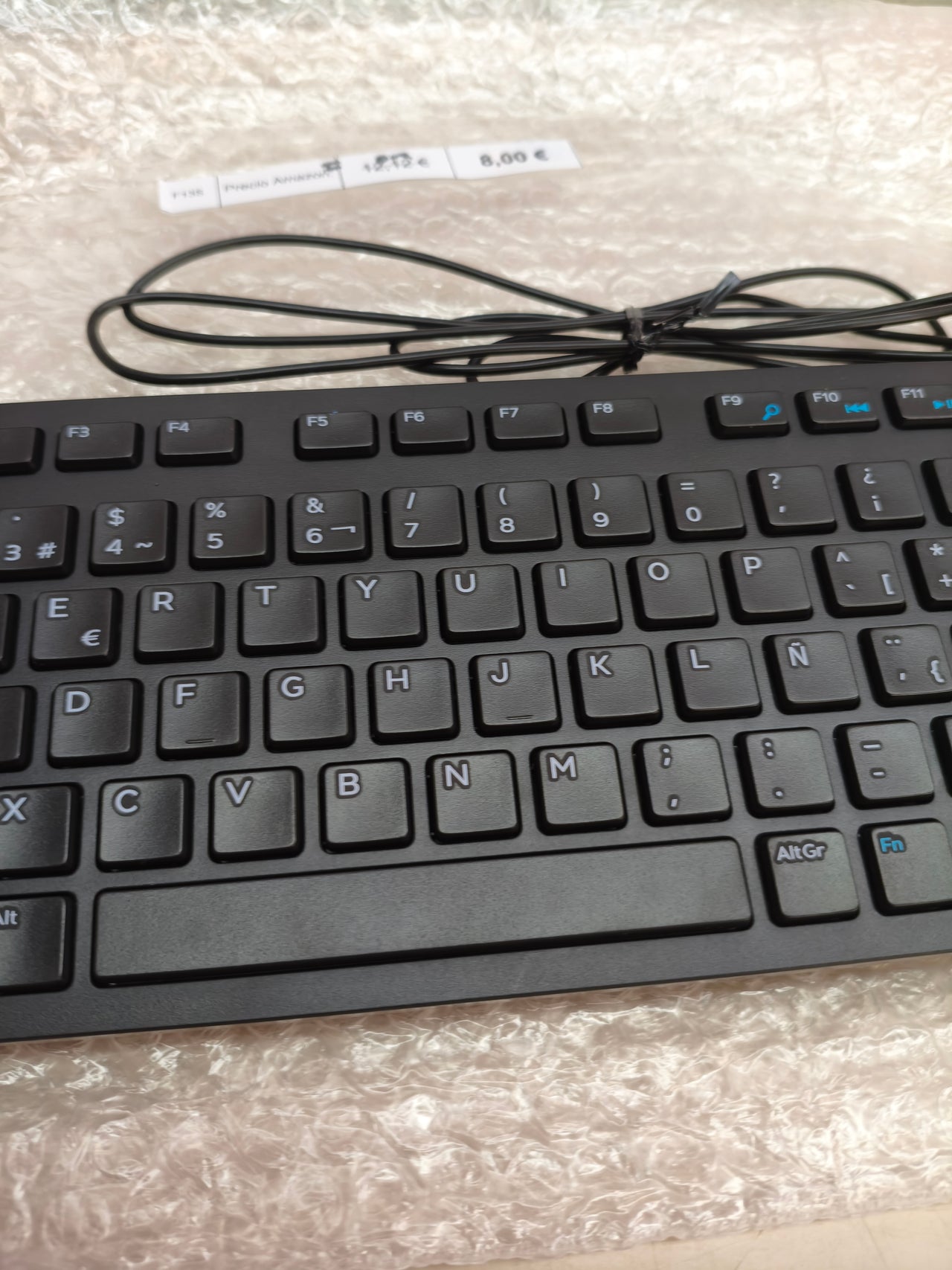 Teclado con cable USB Amazon Basics, español, negro mate