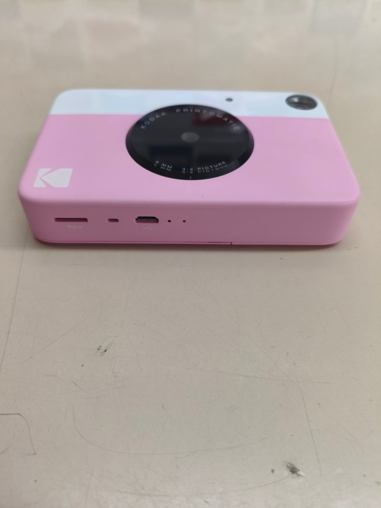 Pack Kodak Printomatic con papel, álbum y accesorios