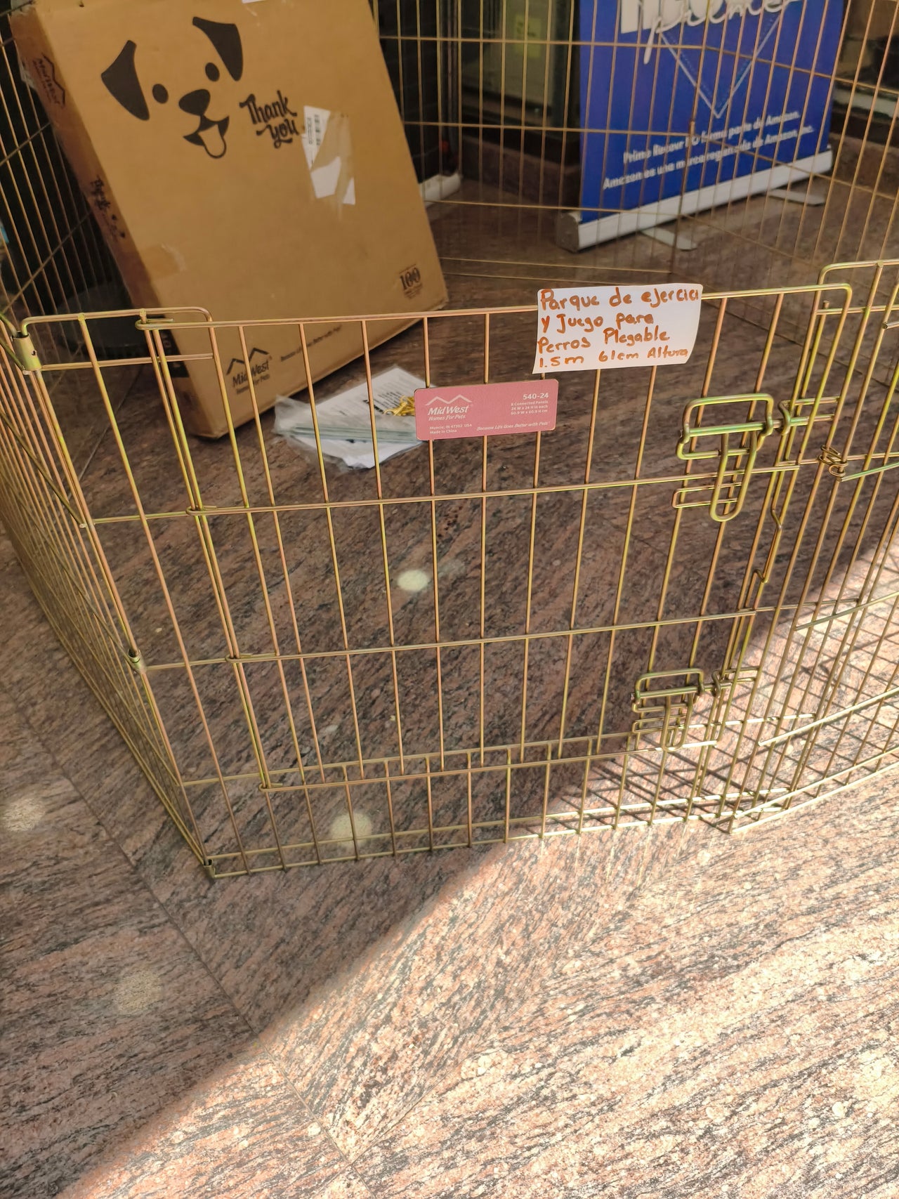 Parque metálico plegable para perros con puerta