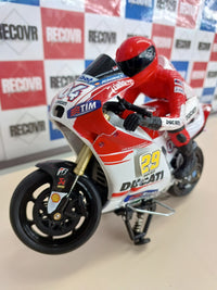 Motocicleta Ducati Desmosedici GP (Casey Stoner #4) – Moto radiocontrol a escala 1:9NewRay 88815