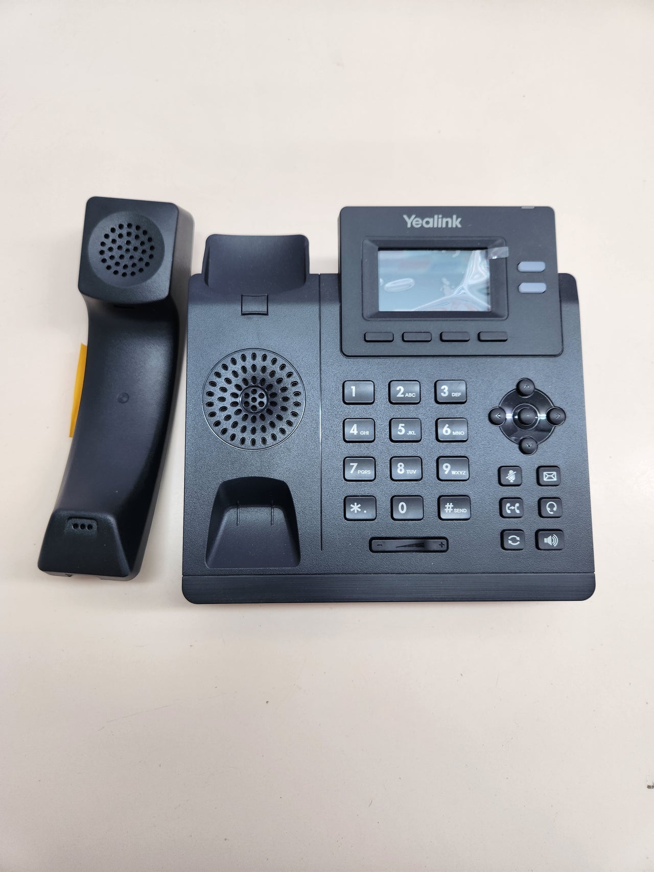 Teléfono Yealink T31 SIP 2 cuentas con PSU