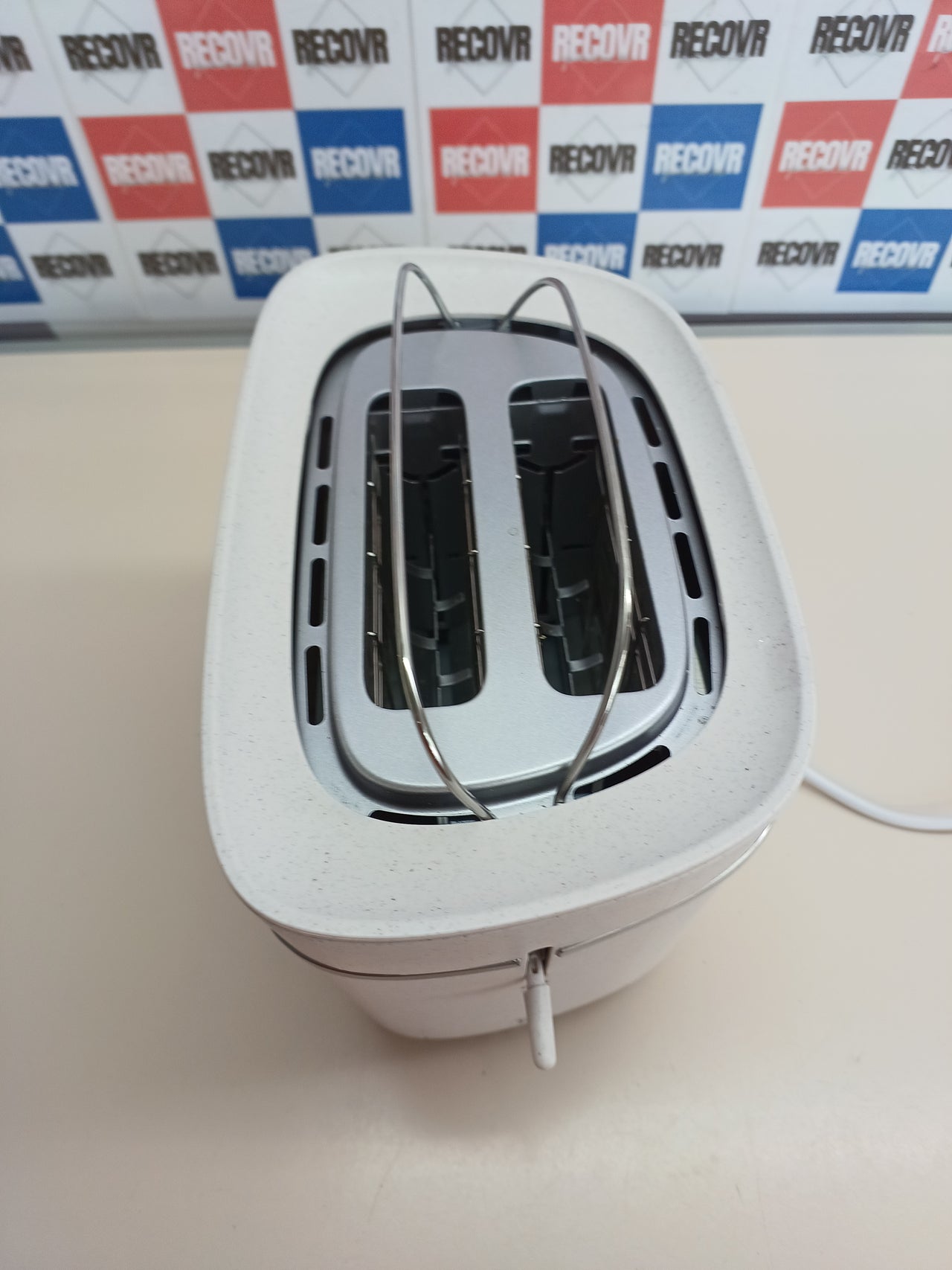 Tostadora eco 2 ranuras 8 niveles con calientabollos - Philips