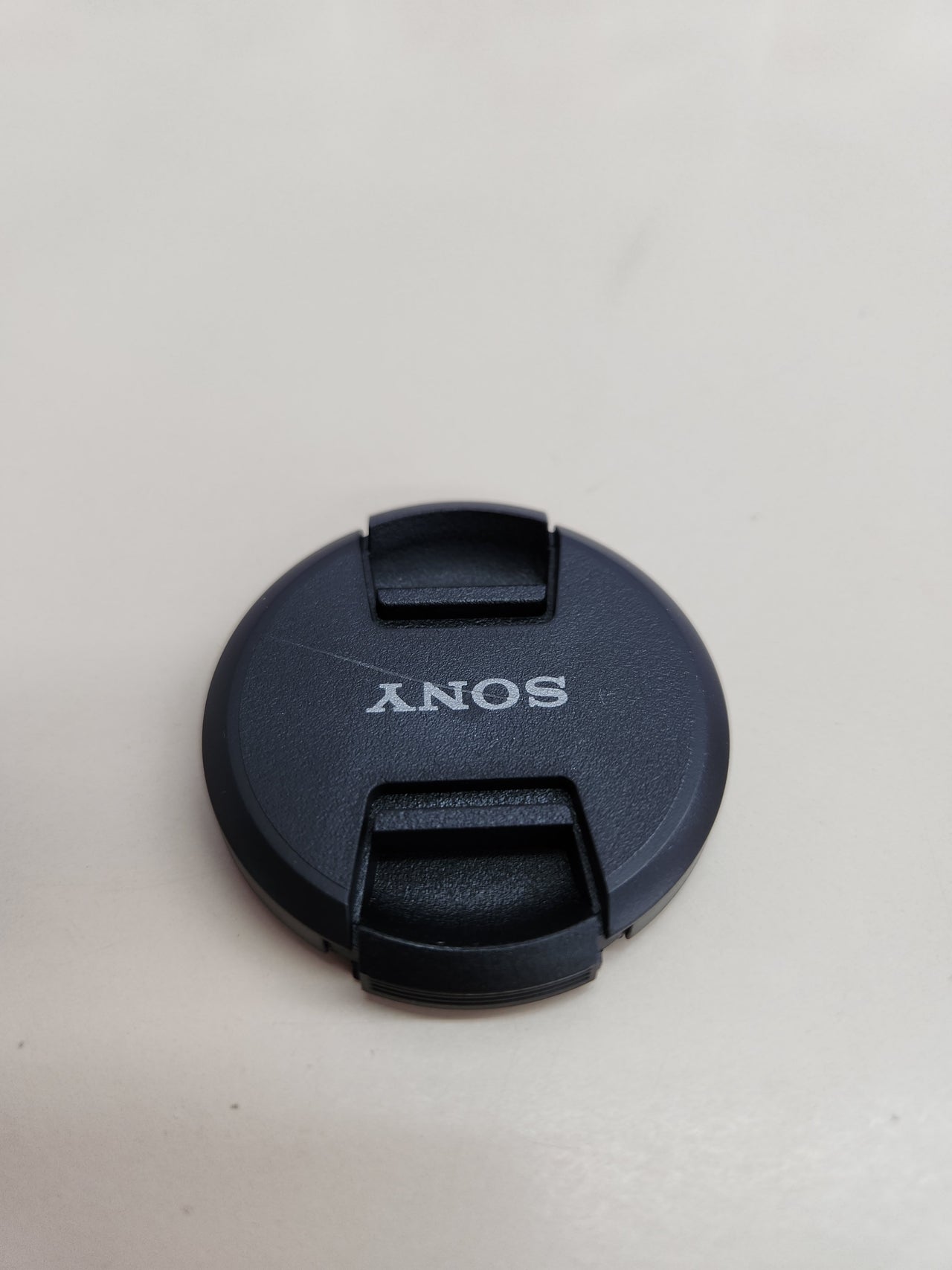 Tapa frontal lente 49 mm Sony ALCF49S