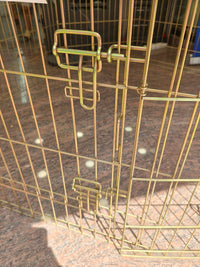 Parque metálico plegable para perros con puerta