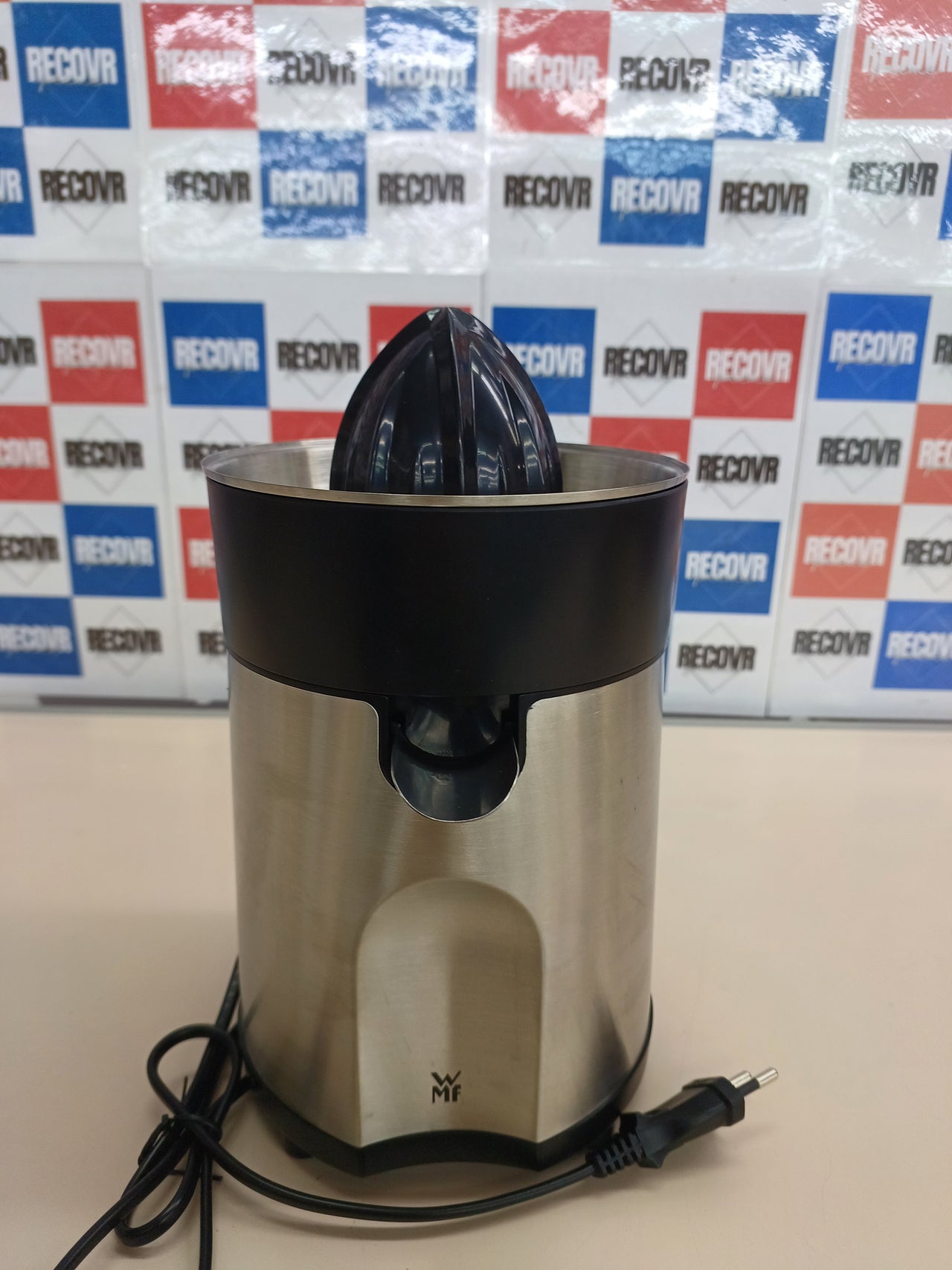 Exprimidor 85W acero inoxidable con 2 conos WMF